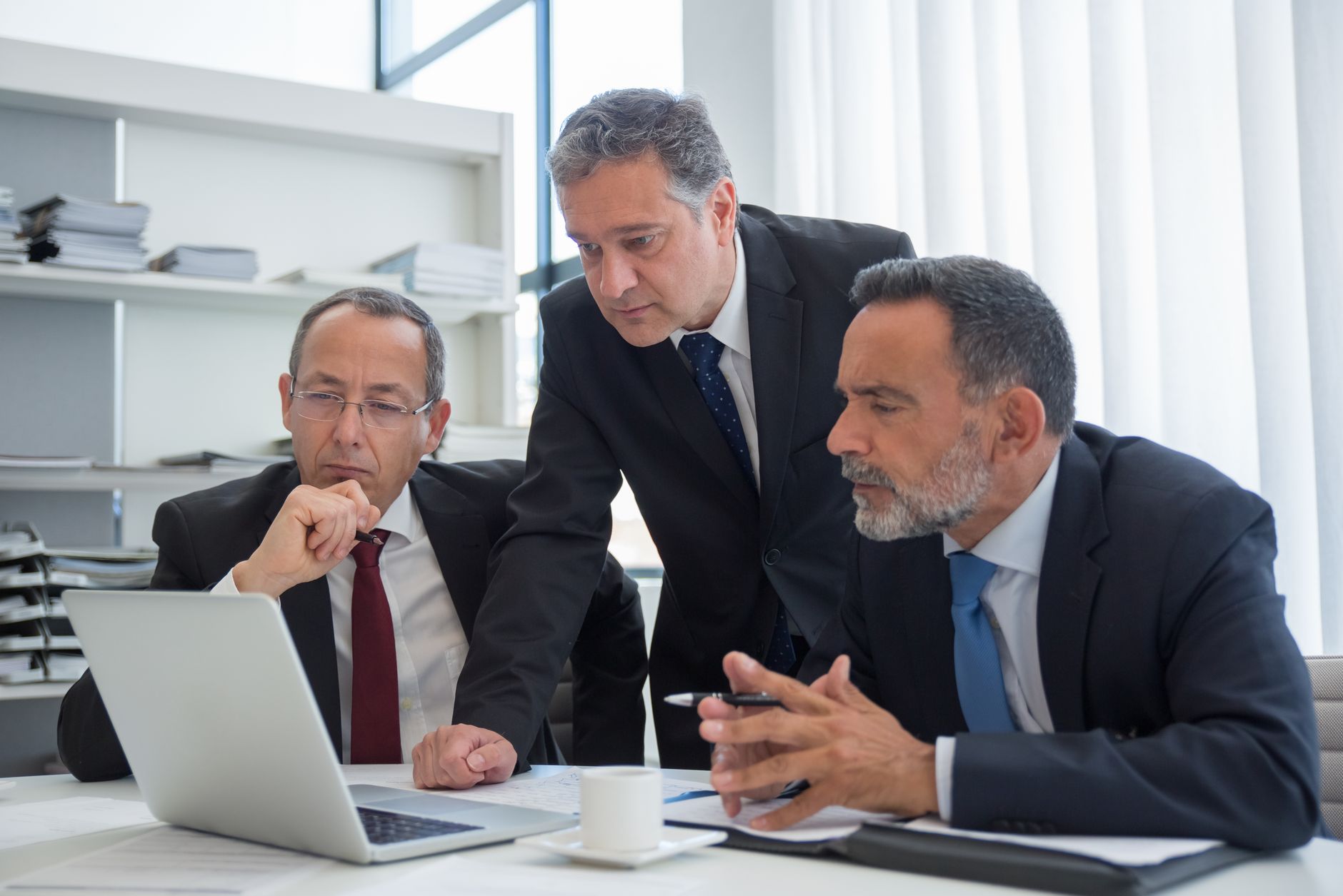 Corporate financial planner verifying forecast projections